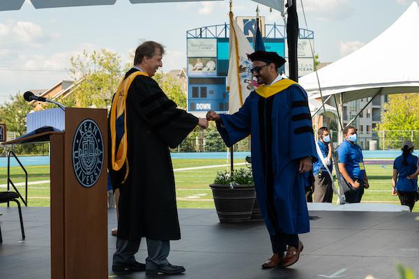 Grad is handed his degree