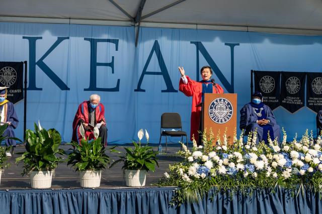 Dr George Chang addresses the grads