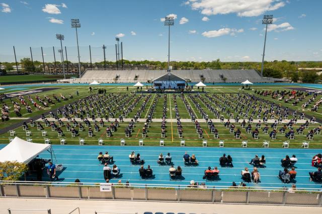Wide angle shot of the Kean University 2021 Commencement ceremonies at Alumni Stadium