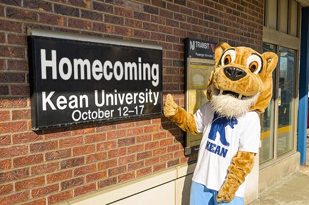 Cougar at Train Station Sign Homecoming Oct 12 to 17