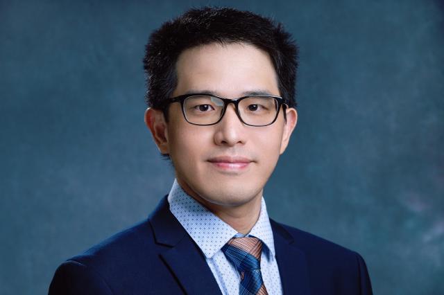 Headshot Image of Assistant Professor Huaibing Yu