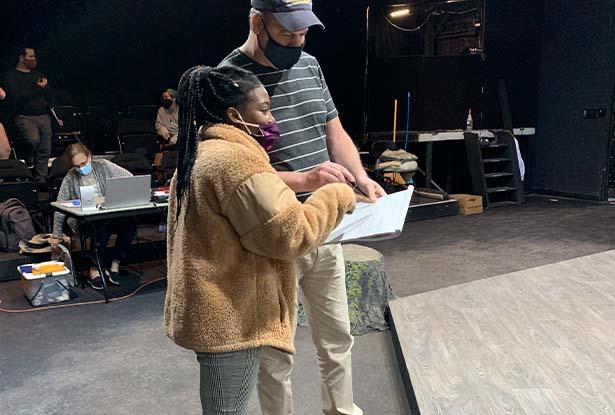 Year One director John Wooten works on stage with artistic and literary intern Latisa Harriott, a graduate of Kean University