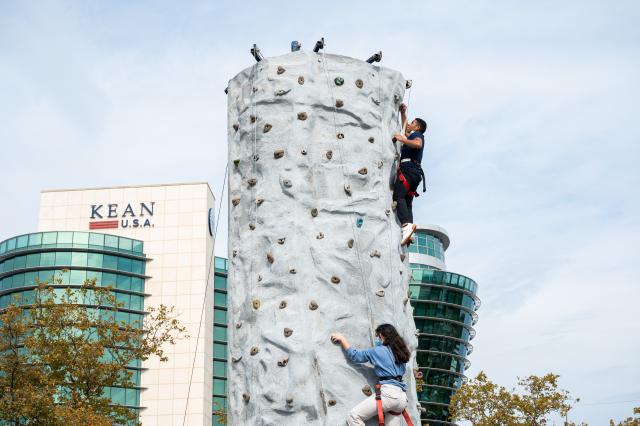 Kids rock climbing at Homecoming 2021.