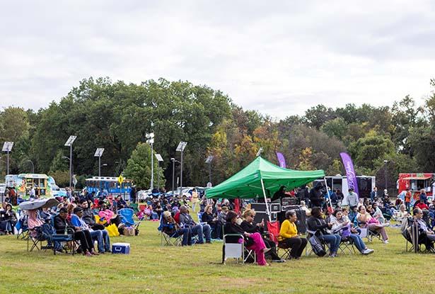 A photo of the crowd watching a jazz band play at the Jazz Roots Festival. 
