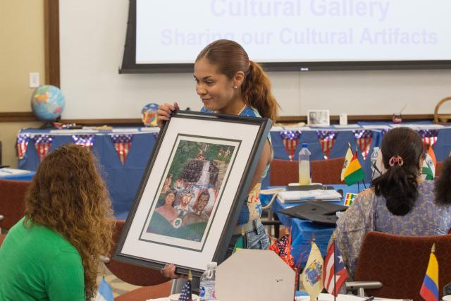 Program graduate shares cultural item.