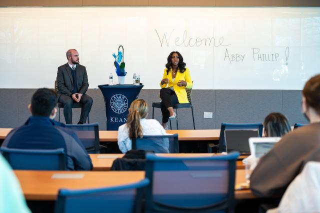 Abby Phillip in classroom w jeremiah sullivan