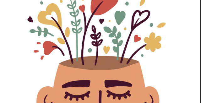 Mental health image of head with flourishing flowers