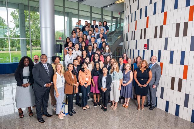 A group shot of new faculty and some Kean administrators at STEM atrium