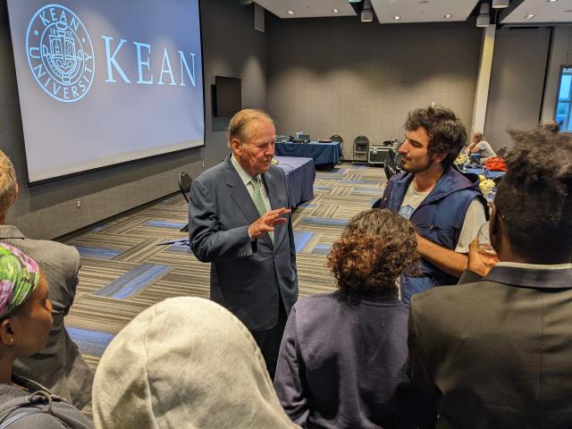 Former NJ Governor Tom Kean speaks casually to a group of Kean University students.