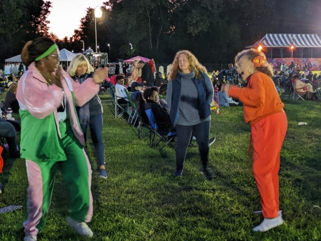 Four women dancing at the Jazz & Roots Festival