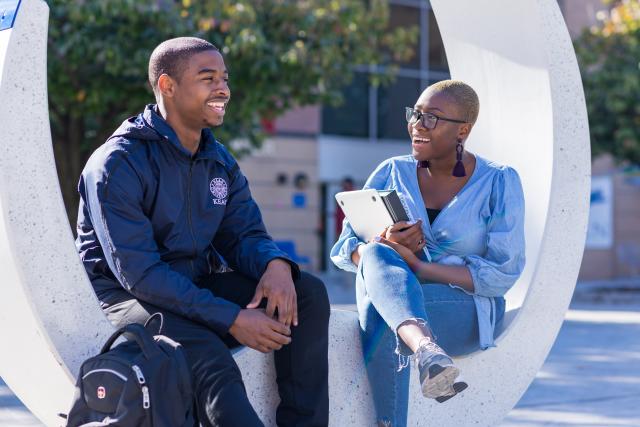 Kean students talk on the MSC patio