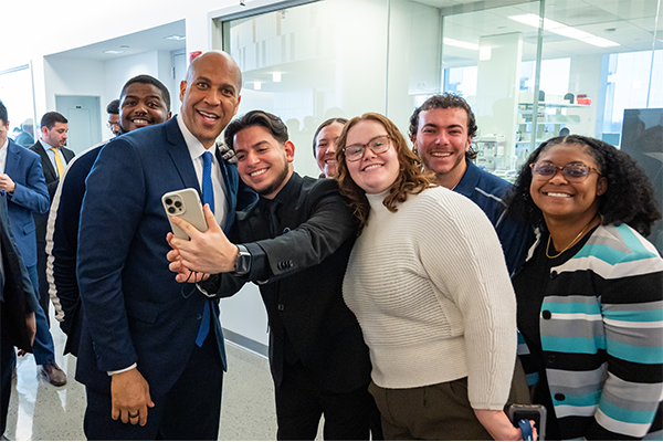 Senator Booker poses for a selfie with Kean students