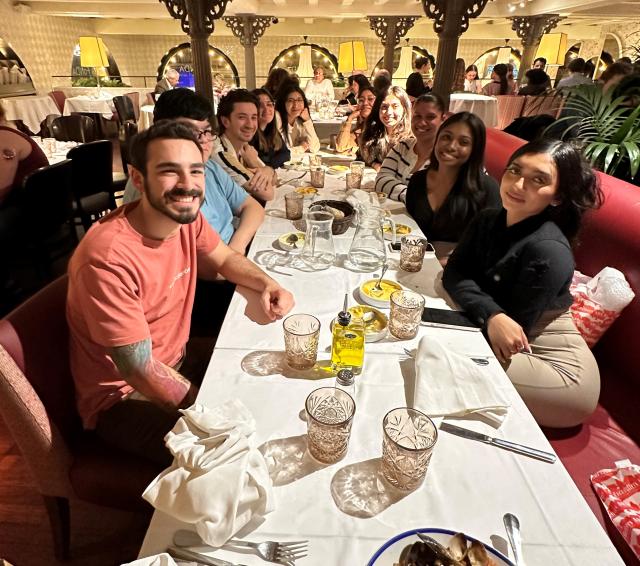 Travelearn students enjoying a meal in a restaurant in Spain