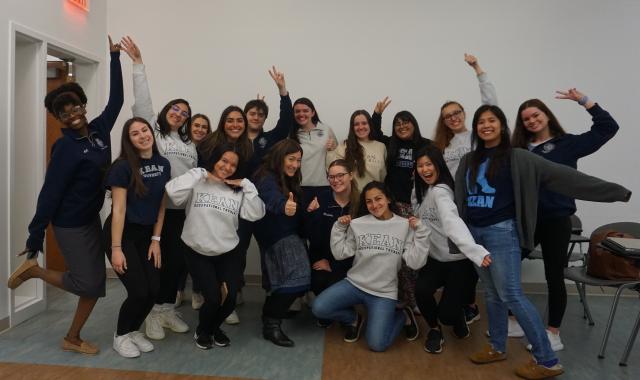 Group photo of second year OT students wearing Kean merch with Dr. Friedman