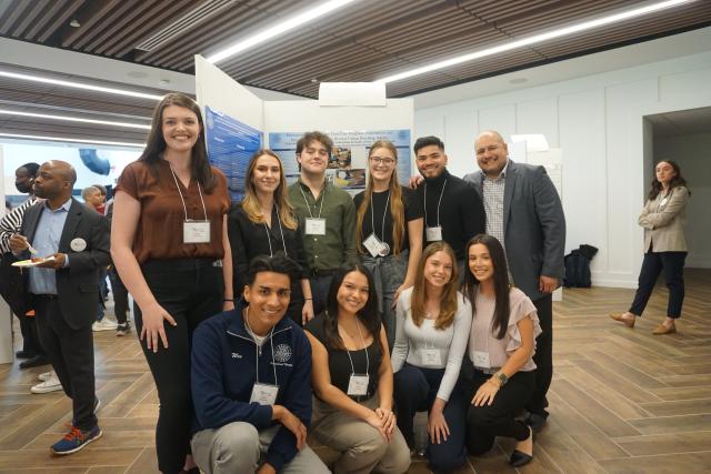 Dr. Victor Michael Camacho and second year students presenting at Research Days 2023