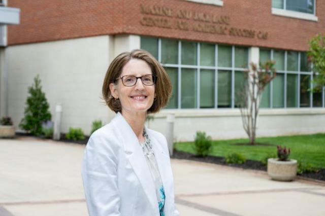 Jessica Thurlow, new dean of CLA, stands in front of CAS