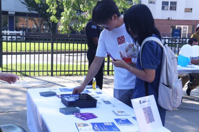 Students peruse information at the Kean Wellness Expo