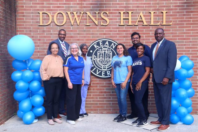 Kean staff gather at the newly renovated Wellness Center in Downs Hall