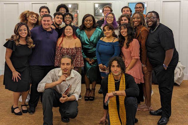 Tony winner Alex Newell poses with Kean students backstage.