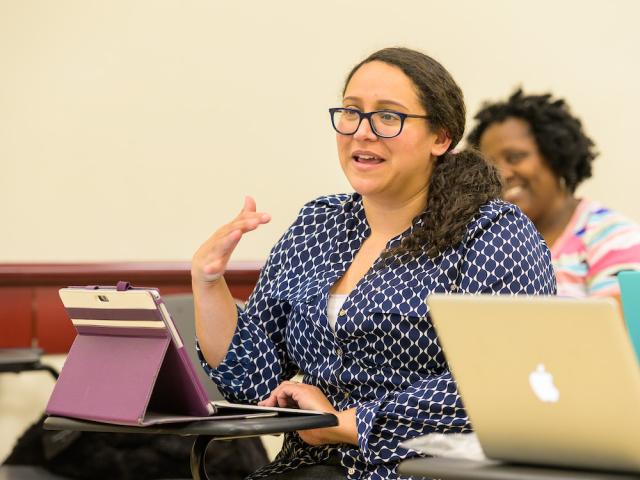 An Education major expresses herself in class