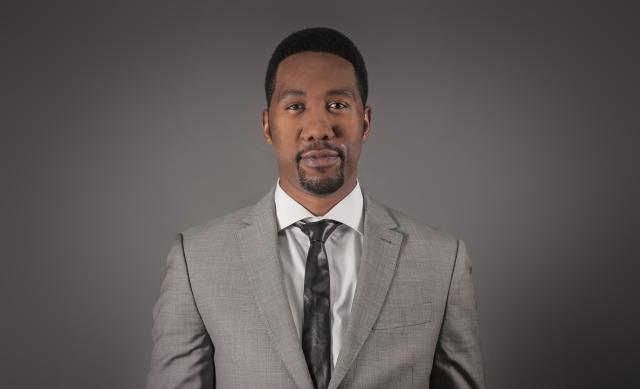 Head and shoulders shot of Ndaba Mandela, wearing a suit. He is Nelson Mandela's grandson.