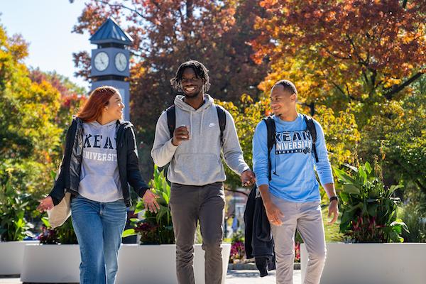 Kean students walk near the clock tower