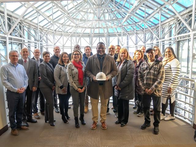 President Repollet and senior staff tour building site