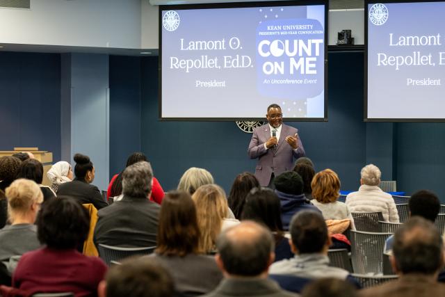 Kean President Lamont Repollet, Ph.D. speaks to the crowd at the Midyear Convocation