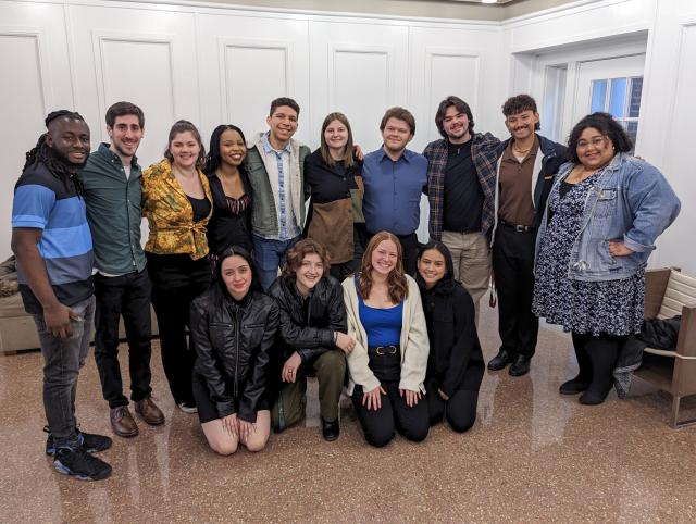 A group of Kean students and recent alumni pose on East Campus.