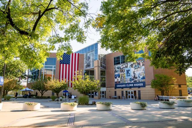 Miron Student Center at Kean University in the summer, surrounded by trees.