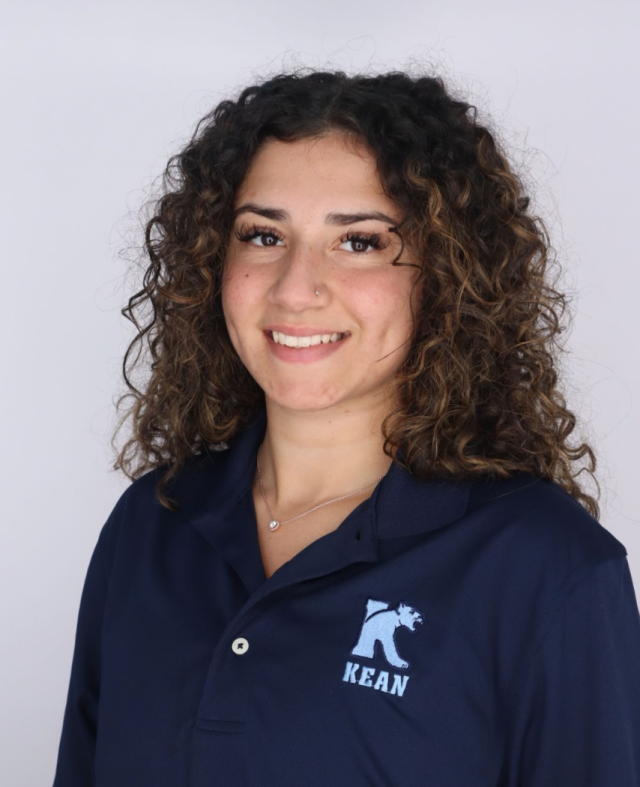 Professional photograph of Renee Rocha wearing a Kean University polo shirt