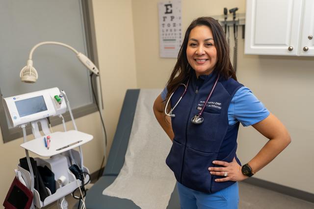 Nurse practitioner Major Kristine Sparks pictured in the exam room at Kean  Wellness Center