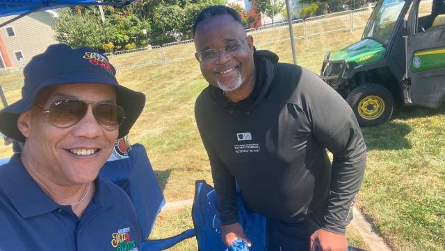 Mike and President Repollet on the lawn