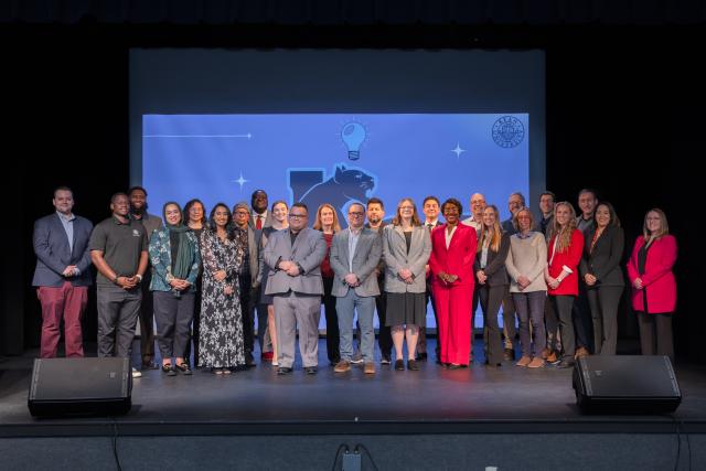 Kean staff members on stage after presenting ideas in the Think Tank Hackathon