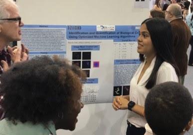 Bianca presenting her poster