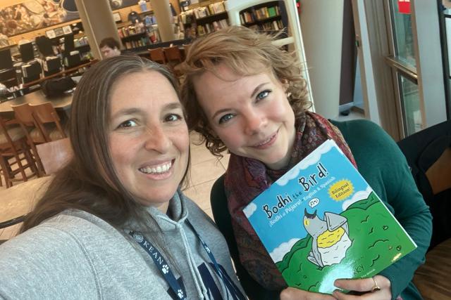 Children's book author Charlene Higgs, on right holding book, with Kean lecturer Amanda Rodrigues