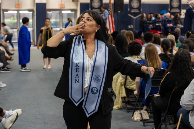 Honors graduate blows kiss to family in the crowd