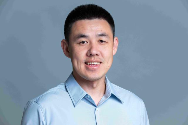 Professor Guanghua Wang
