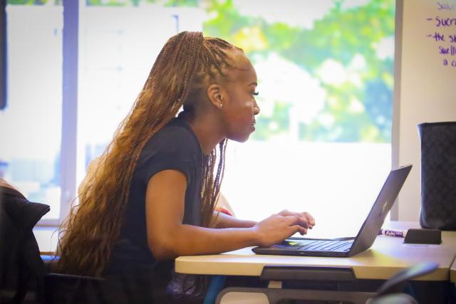 Student working on a laptop