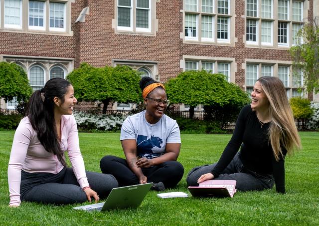 Kean Jersey City students pictured outside of Hepburn Hall 