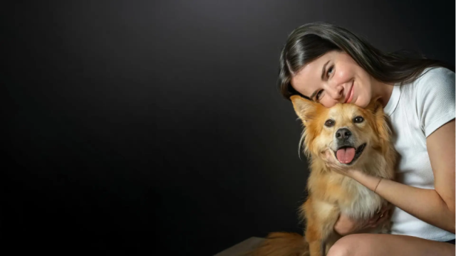 Woman holding a dog