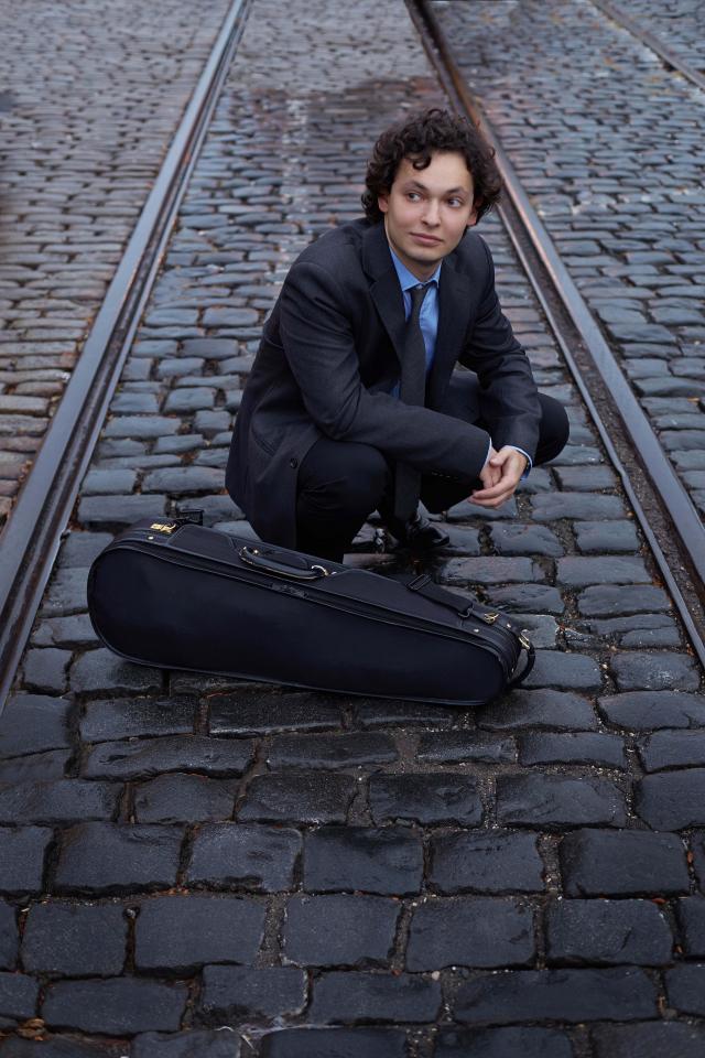 a person sitting on a bench