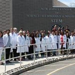 stem group photo of faculty in white coats